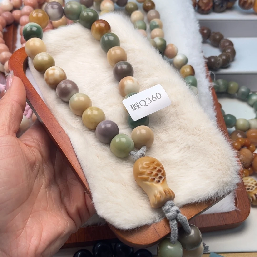 菩提根/象牙果手串锋*15mm苹果手持瑕疵Q360