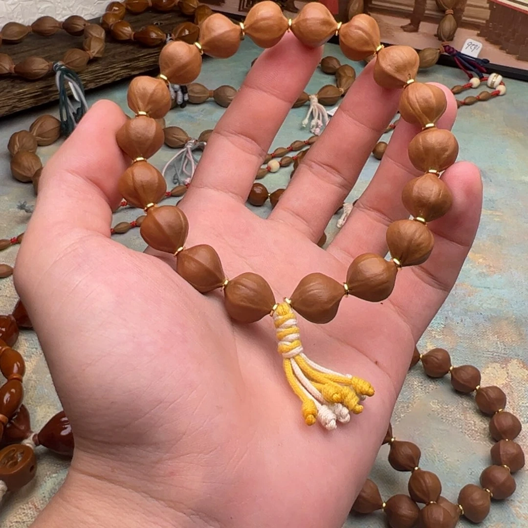 秋***生橄榄核手串/手链密桃臀水晶核1.3