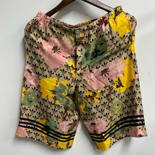 全新未使用 GUCCI/古驰 古驰ad联名沙滩短裤轻薄夏季潮流印花