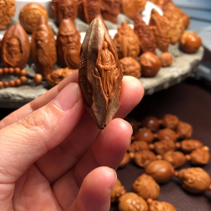 藏***锋吊坠橄榄核橄榄核雕刻手把件