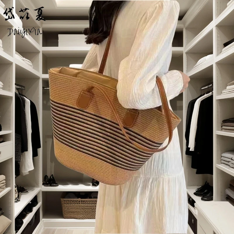 气质大容量草编包包2025新款手工编织包单肩腋下包时尚条纹女包