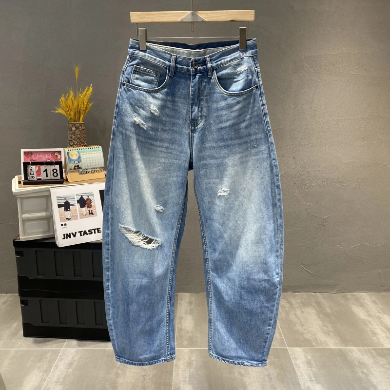 潮牌水洗浅蓝色破洞阔腿牛仔裤男士2025春夏新款宽松百搭弯刀长裤