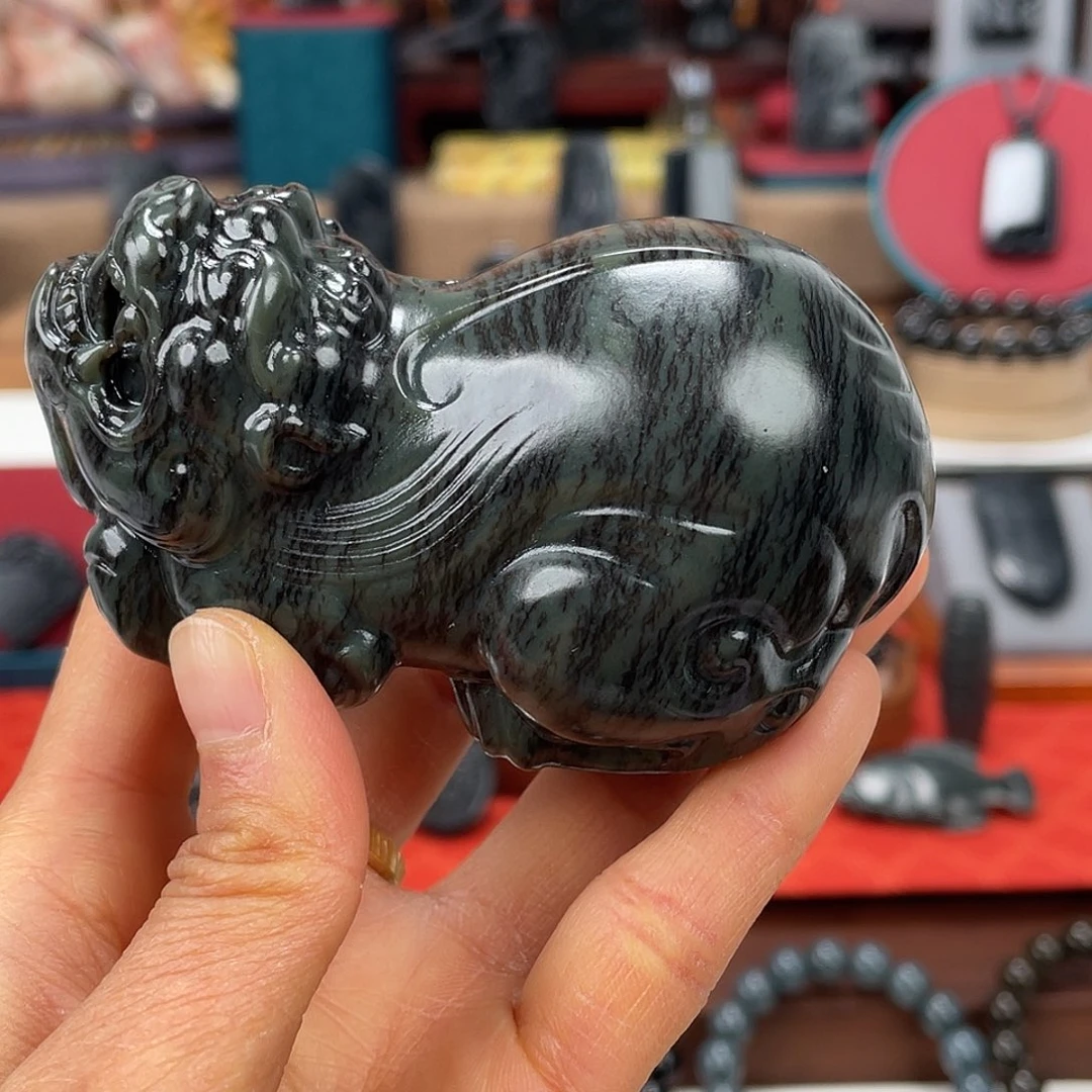 莺****和田玉未镶嵌把件沙枣青特色料