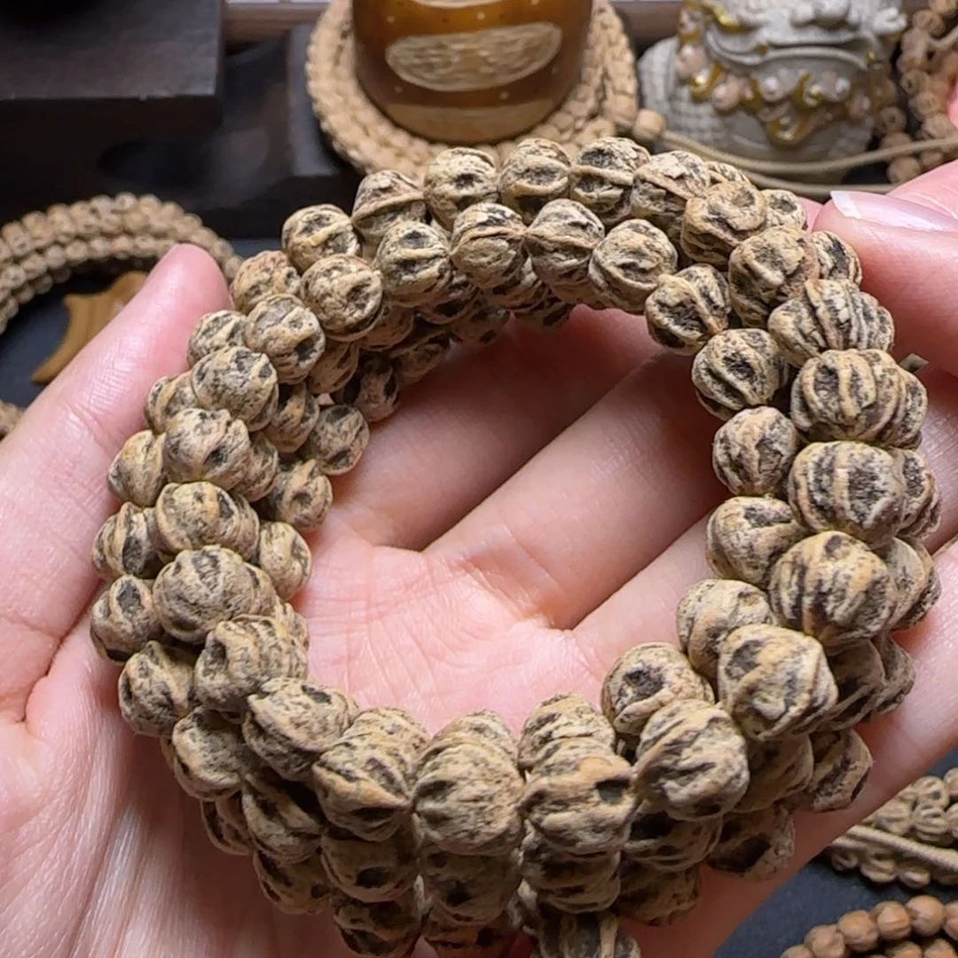 蝶***衣柏香籽/百香籽吊坠