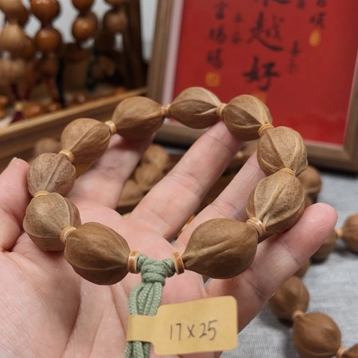 橄榄核手串是****ღ梅林铁核17.25橄榄核