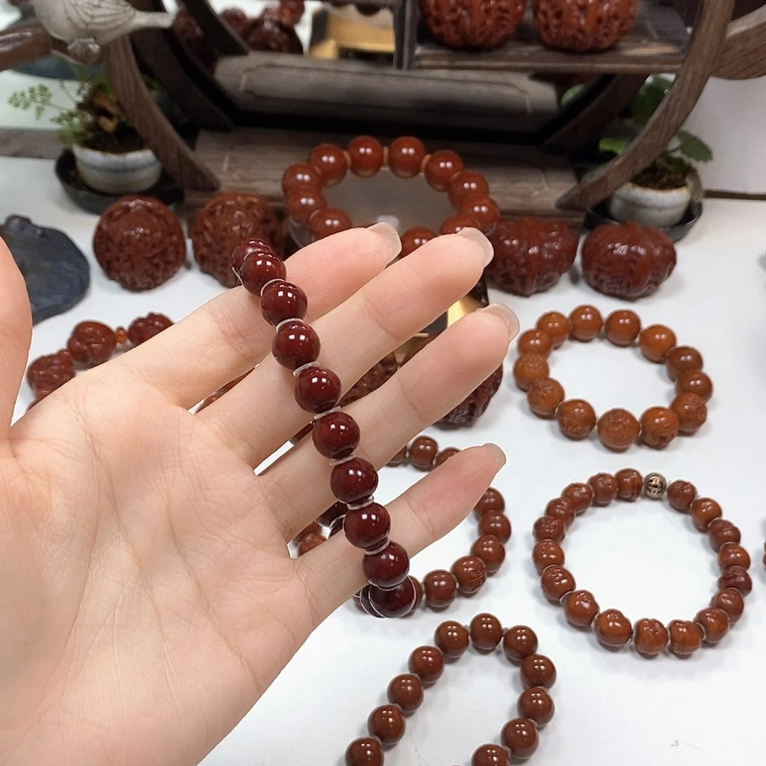 橄榄核把件嚯****子光珠手串