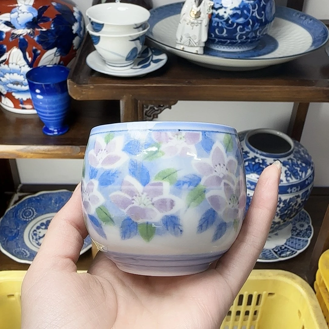 格*完美主义者慎拍茶杯