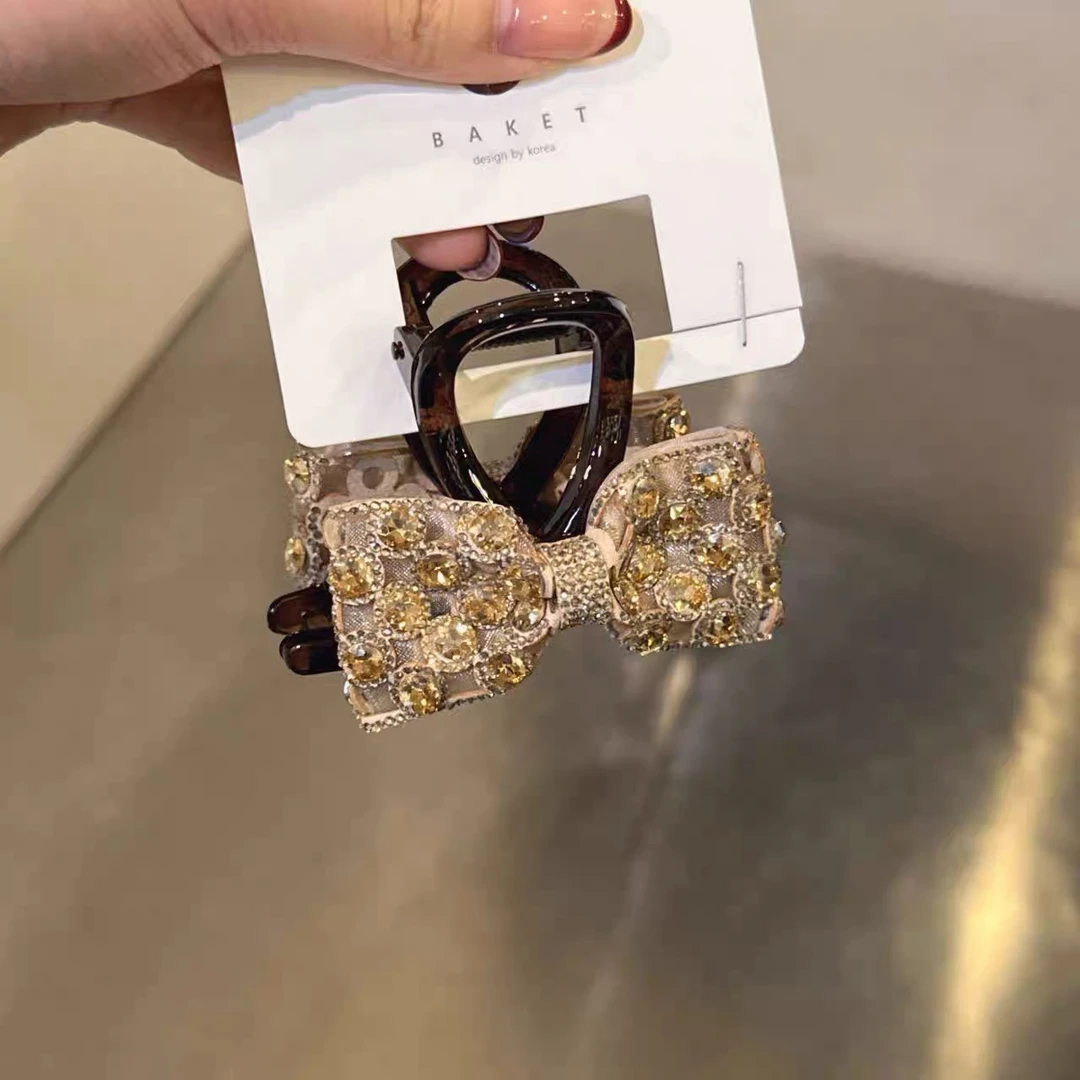 韩代.许妍千金风  超闪满钻抓夹 香槟色 L25101774