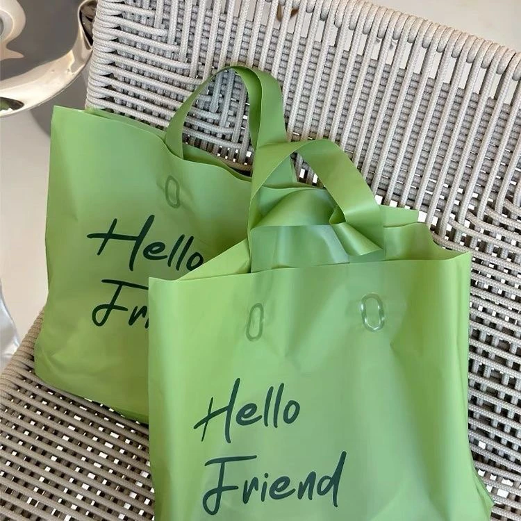 简约时尚女装塑料手提袋磨砂哑光加厚服装店高档包装袋定制logo