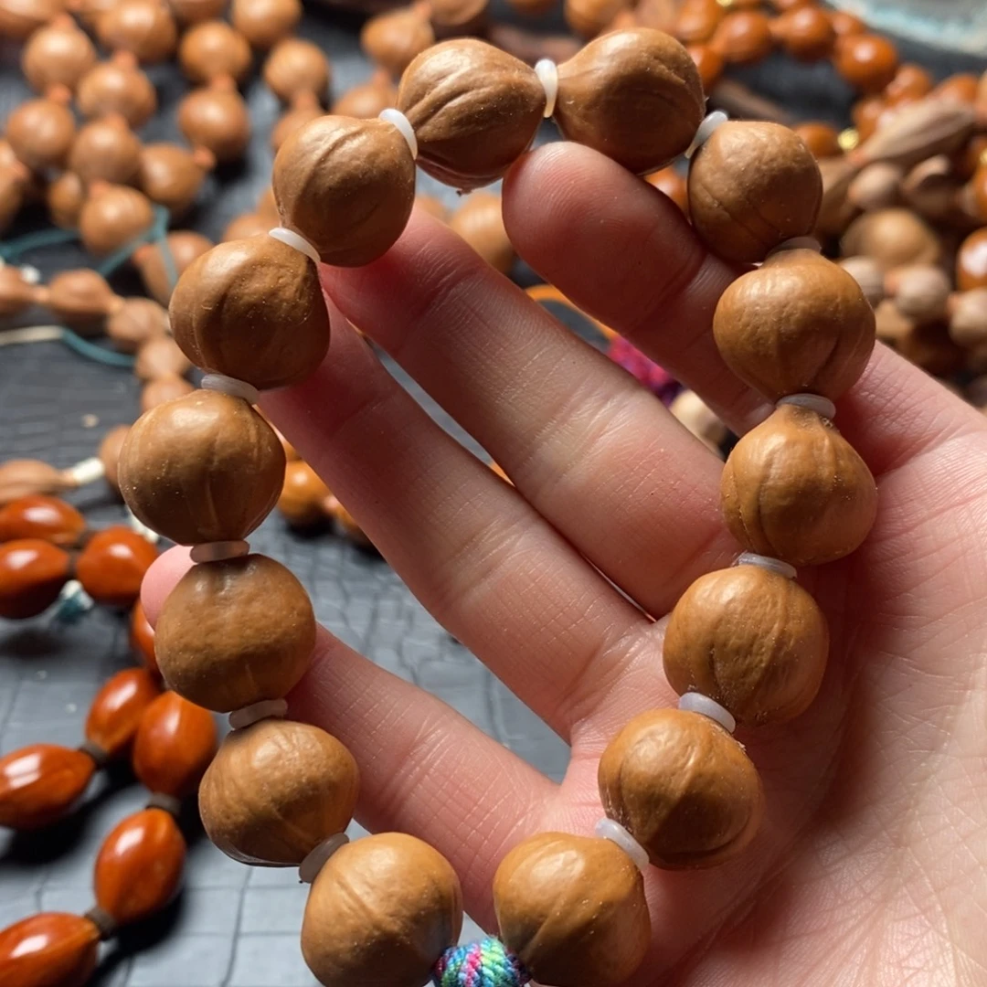 堂***德吊坠橄榄核橄榄核