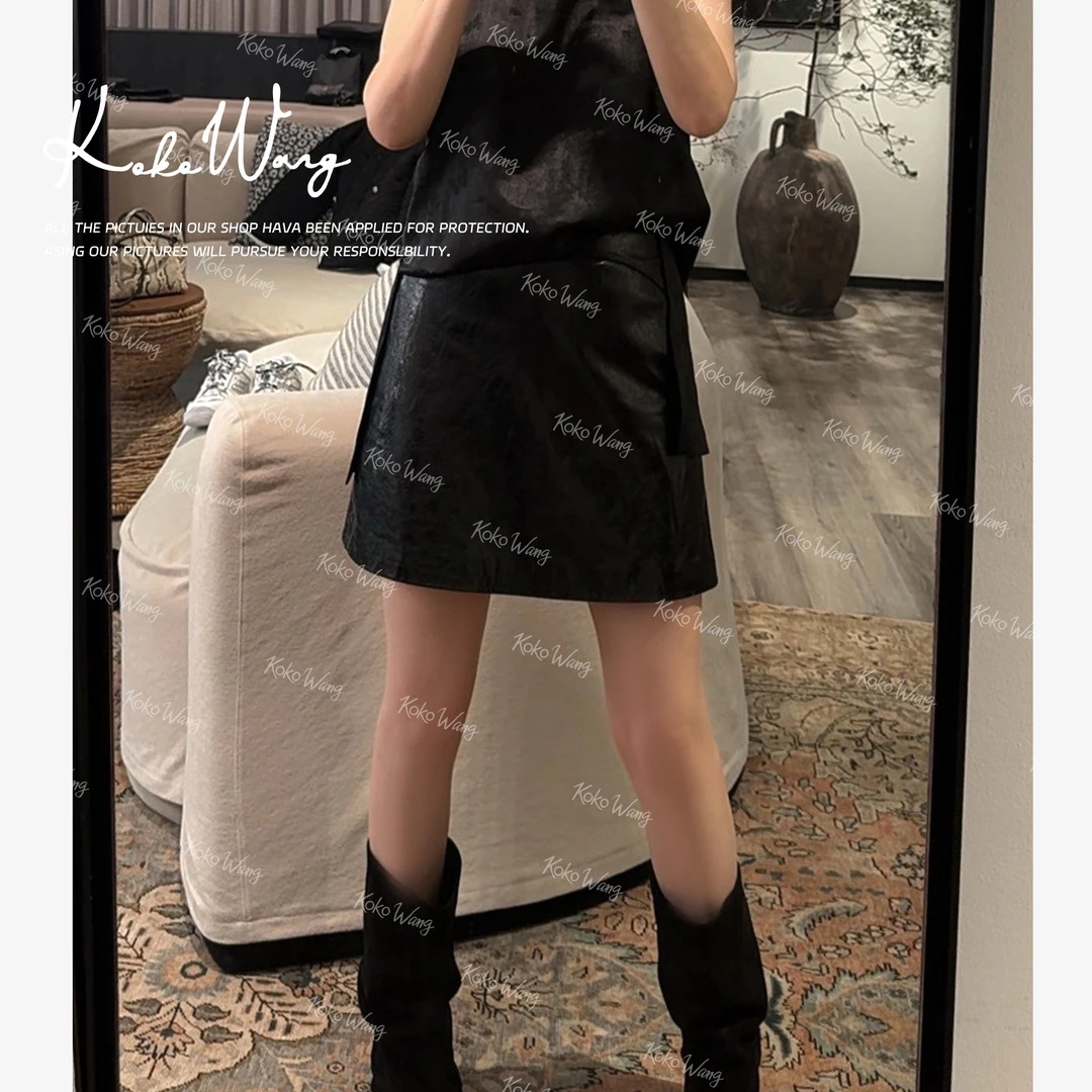 KOKO WANG新款时尚气质进口A+羊皮显瘦百搭a字半身裙590685F18Q41