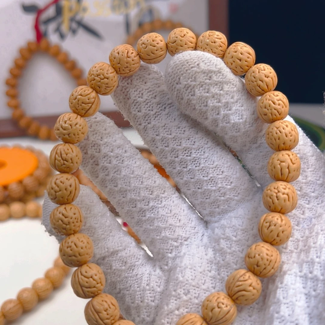 李***机桃核手串1.1加「水晶肘子」野生桃核手持