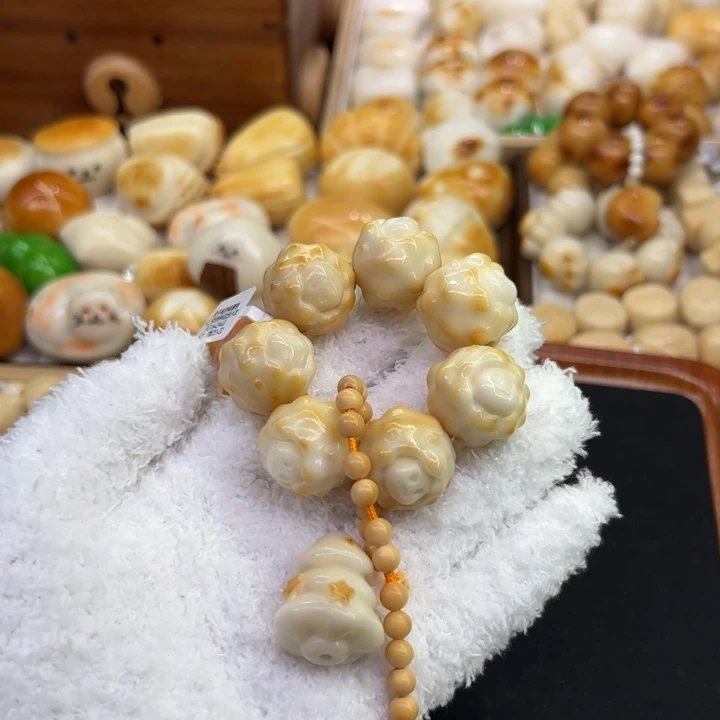 棠****菩提根/象牙果把件64 象牙果原果雕刻炭烧小羊手捻