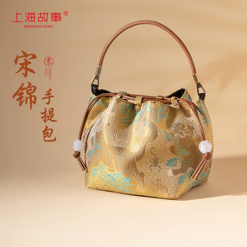 上海故事上海故事2025年新款宋锦新中式国风云朵包包ND2522101