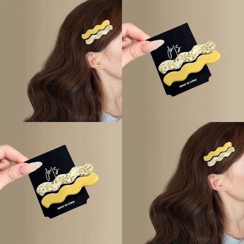 温柔奶油黄~2025春夏新款韩版甜美醋酸波浪鸭嘴夹黄色旅行发卡