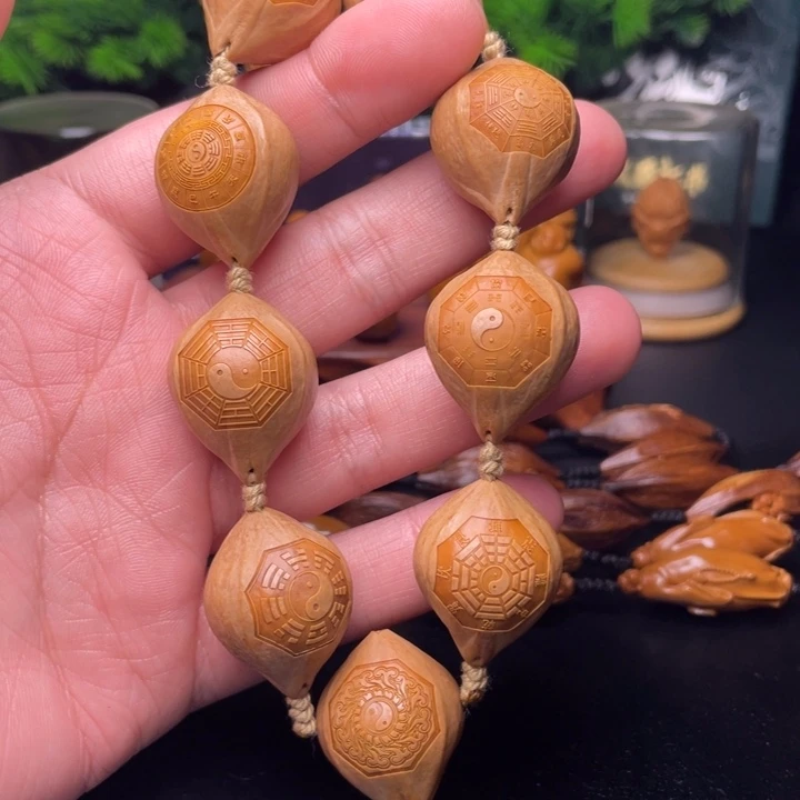 橄榄核吊坠冰**人橄榄核