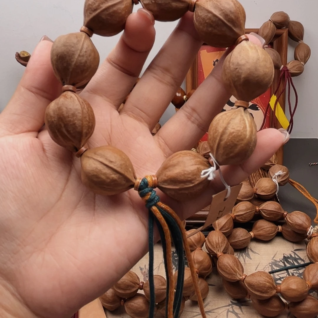 季***旭手串橄榄核22.27梅林铁核