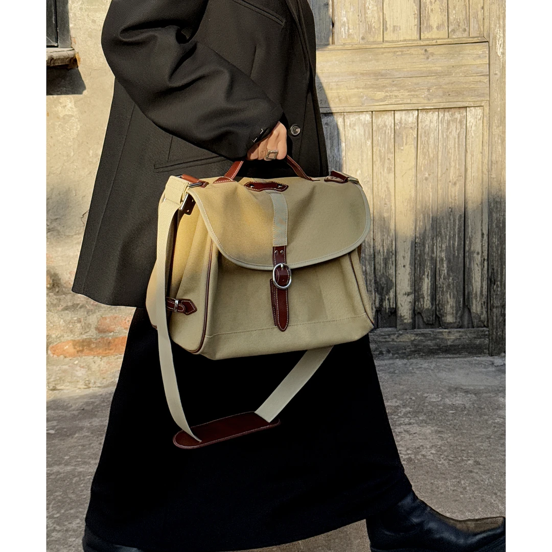 JISHE即奢高质感小众设计帆布邮差重工通勤单肩斜挎手提包AL8998