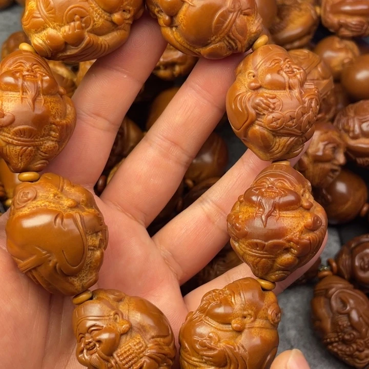 浪***沙橄榄核吊坠橄榄核手持