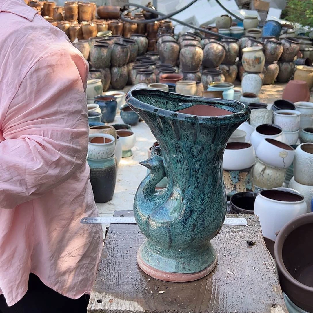 紫砂花盆孔雀一个