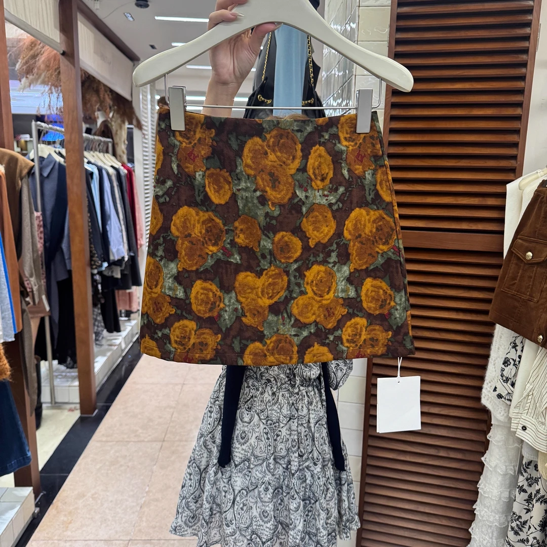 十三行2025秋装复古油画印花半身裙女艺术感高腰防走光包臀短裙