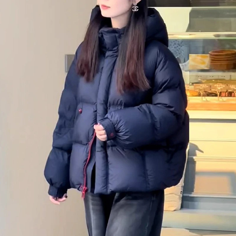 2025新款小众洋气时尚百搭显瘦潮流衣服女纯色设计感连帽长袖棉服