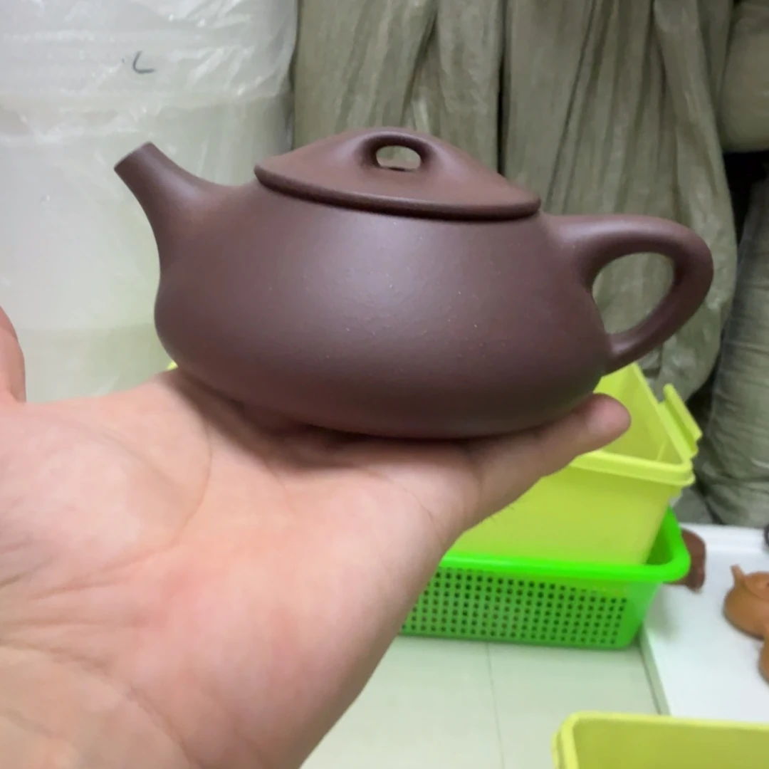 茶杯紫砂微瑕的壶