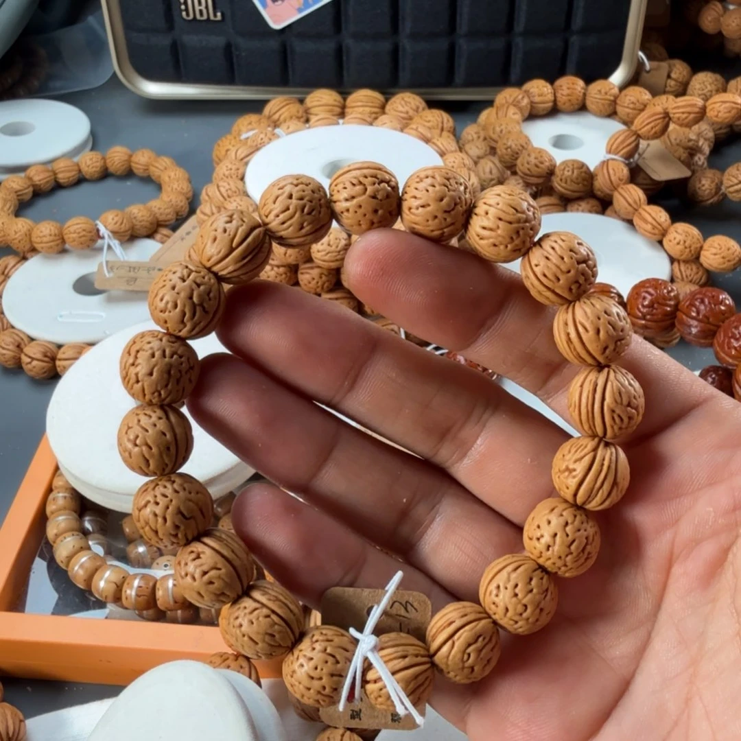 小***鱼桃核手串玉麒麟桃核