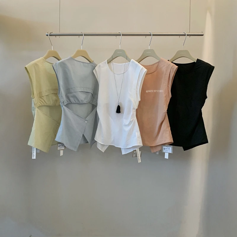 韩系设计感后镂空圆领收腰小衫女士夏季简约气质百搭通勤显瘦上衣