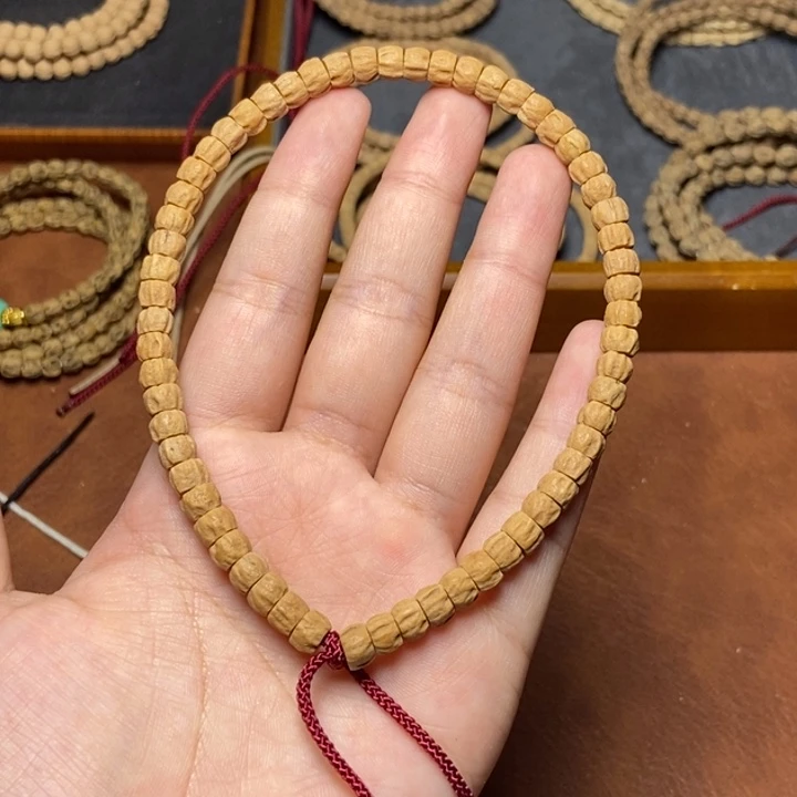 柏香籽/百香籽吊坠手持