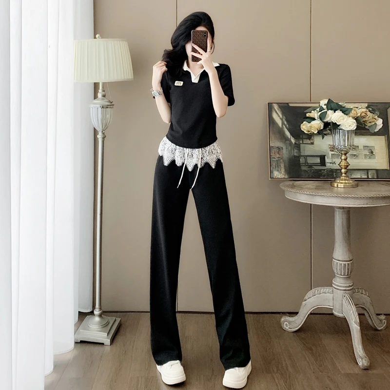 时尚黑色套装女夏季2025新款polo领上衣休闲蕾丝拼接长裤两件套