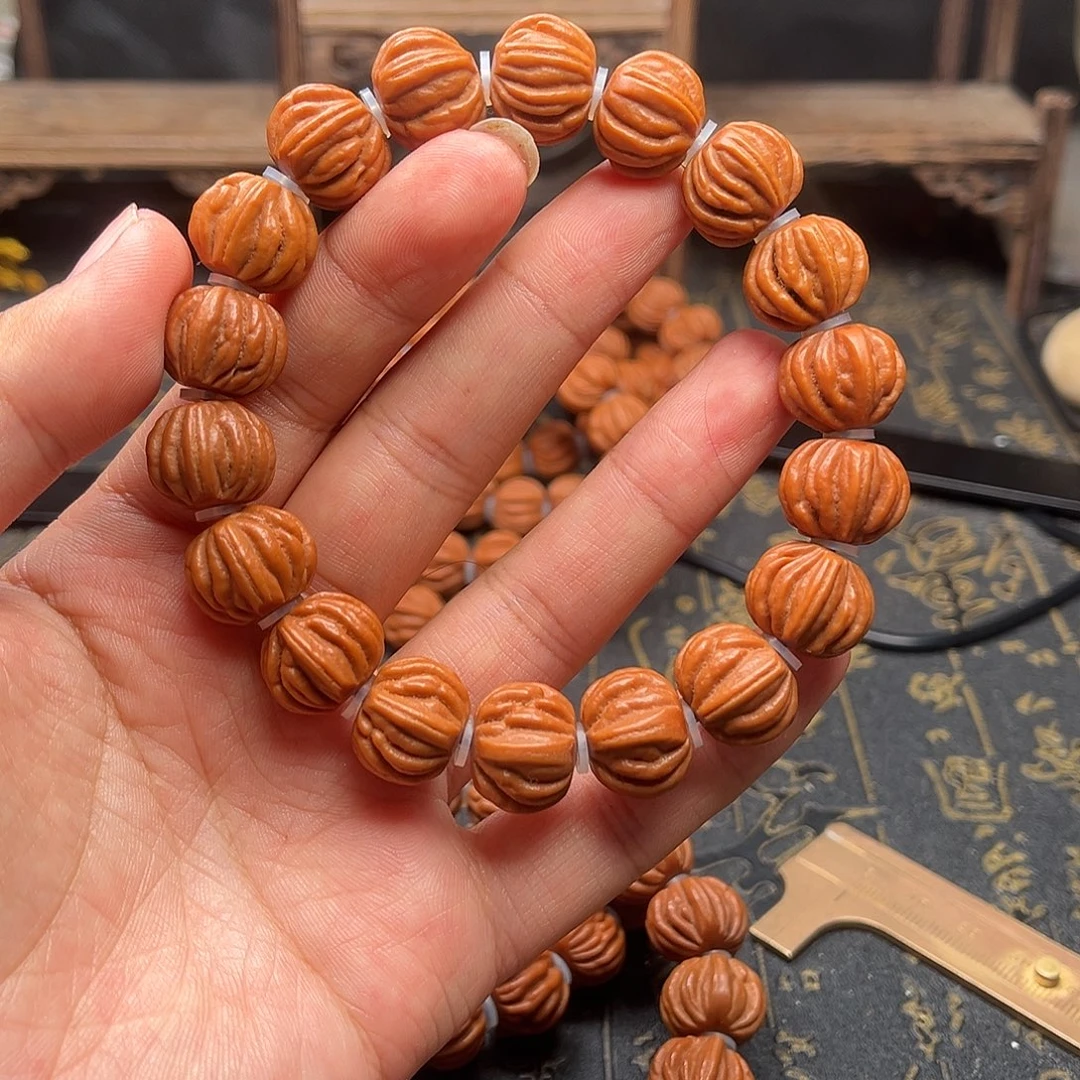 吊坠桃核佛手手串