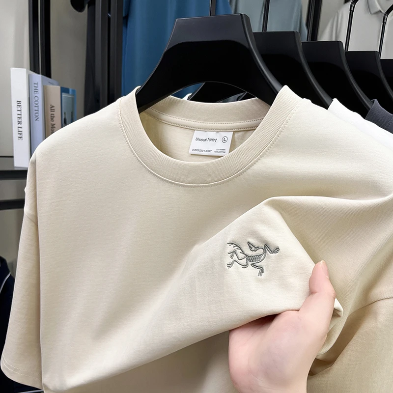 奥莱撒柜【1】折男士休闲圆领夏季丝光棉宽松T恤夏季时尚鸟刺绣上衣