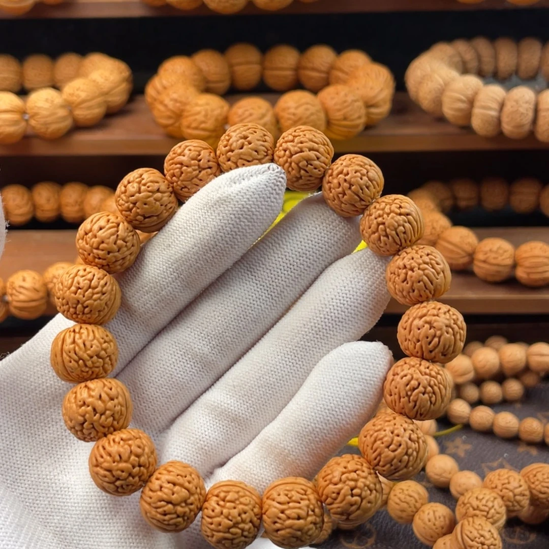 W***L桃核吊坠野生盘龙