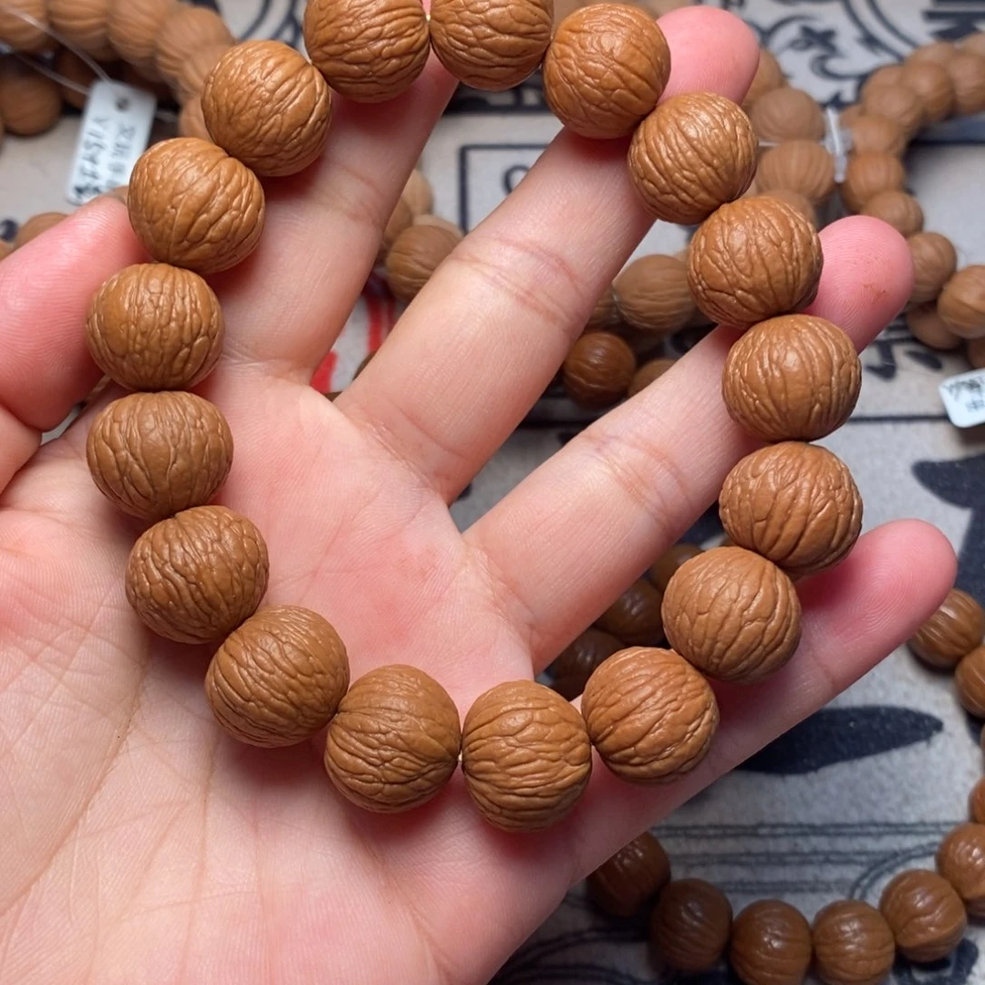 桃核手串精打底凤羽