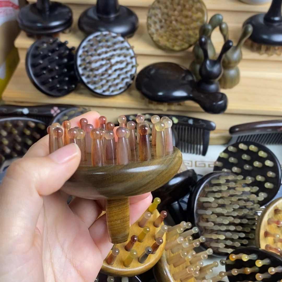 绿檀粉齿按摩梳子