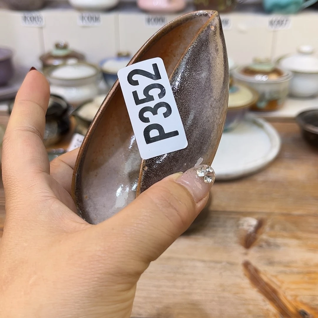 白泥茶杯余*鱼陶瓷艺术