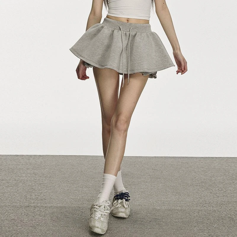 高级感收腰抽绳显瘦蓬蓬裙女春夏新款时尚高腰显瘦减龄不规则短裙