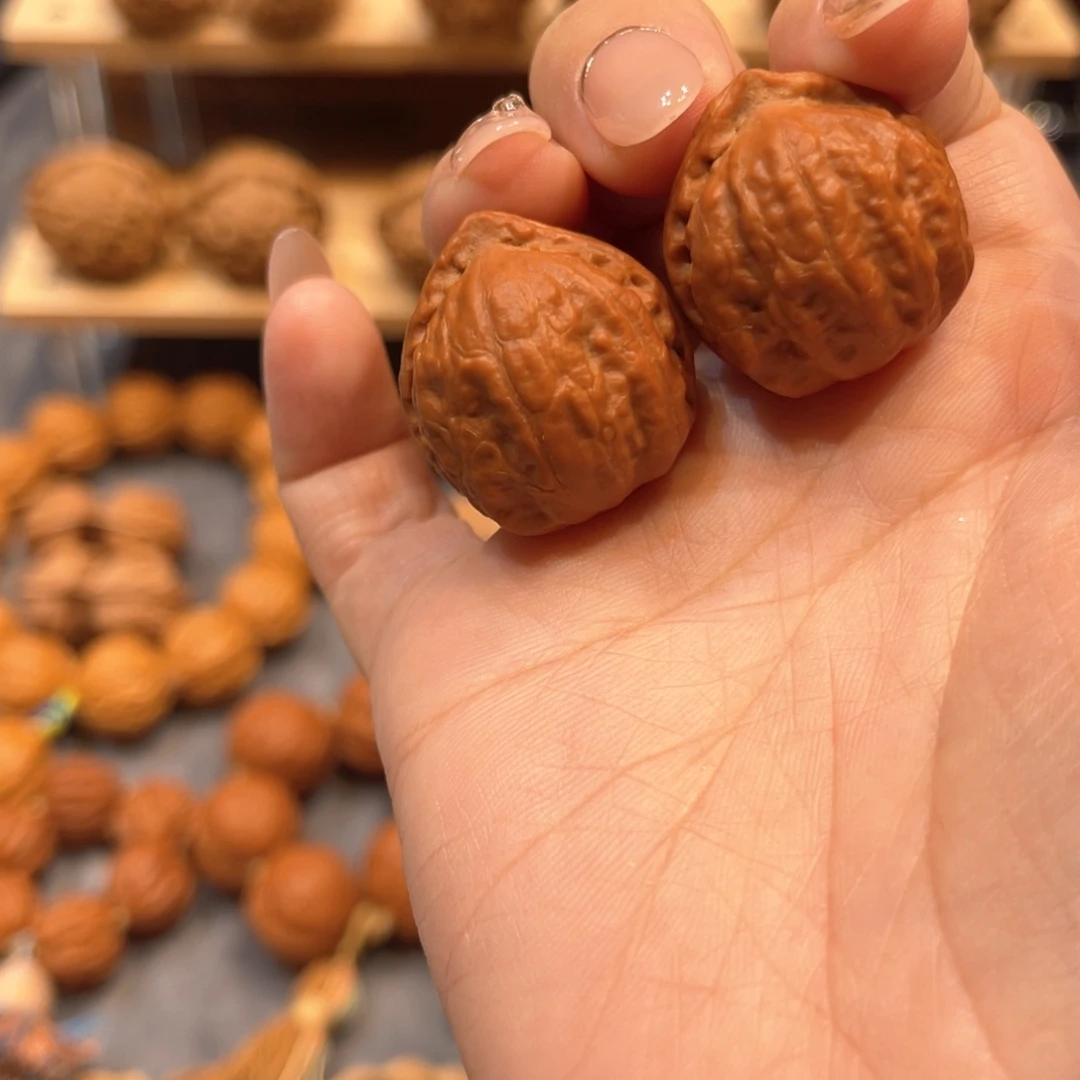 桃核把件爆肉荔枝球