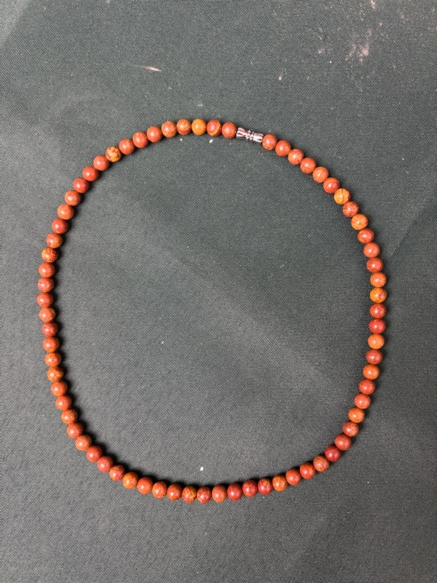 精品砭石老料颈链手把件