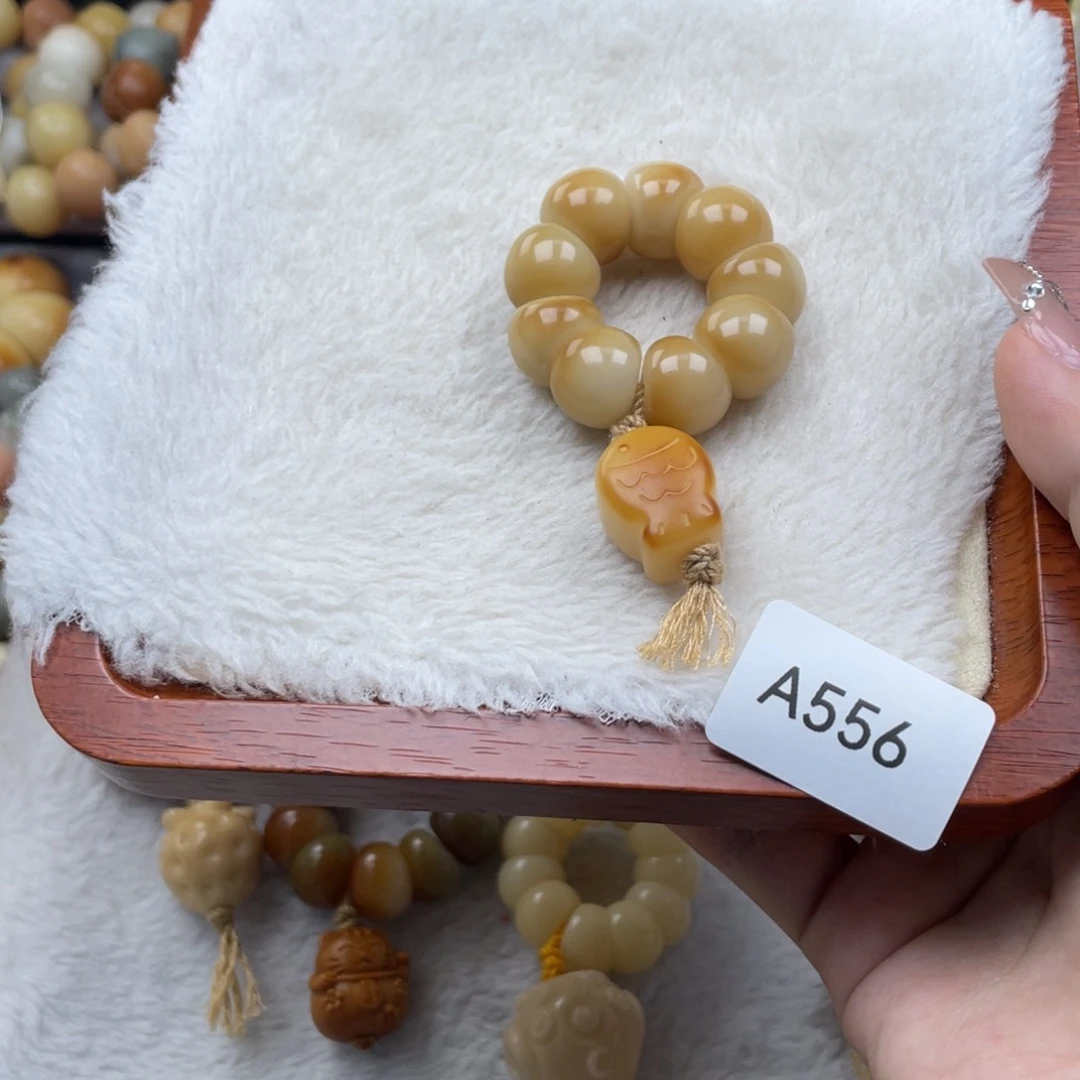 ****e菩提根/象牙果手串瑕A556蒜瓣手捻13mm一串