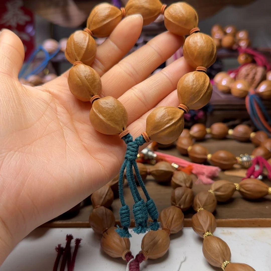 橄榄核手串卑****。2027梅林铁核