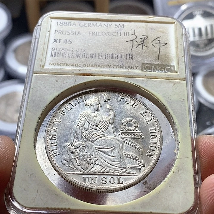 经***6银Ag900秘鲁丰收女神 高银版凸字1索尔银币