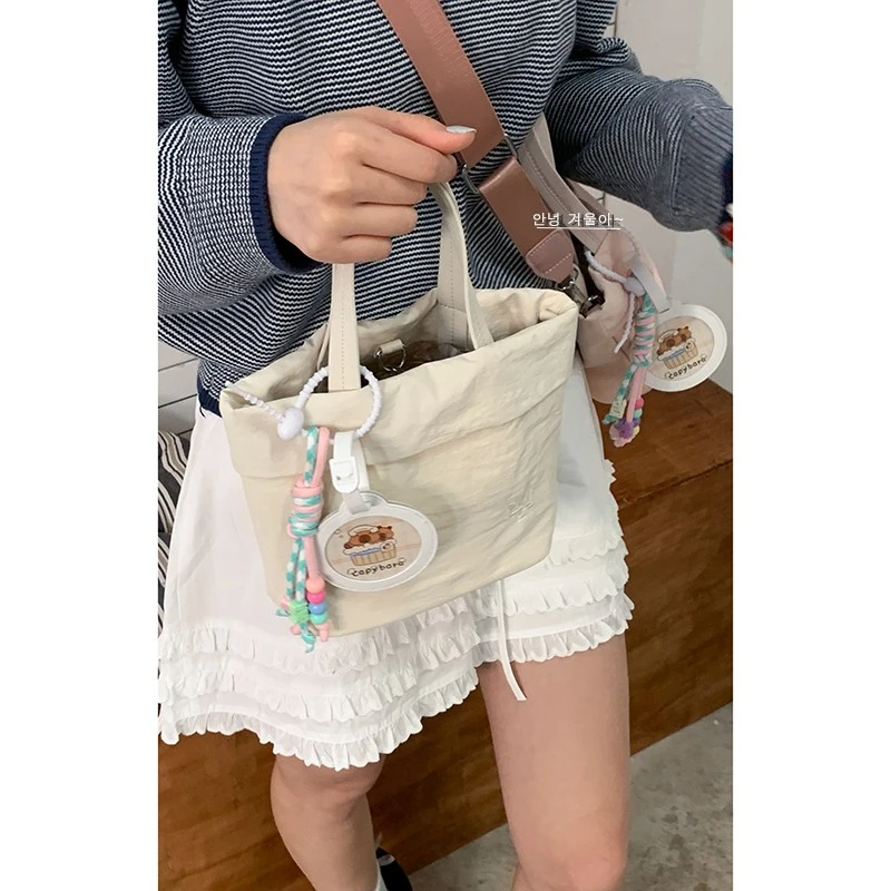 韩系小众手提包包女款2025新款春季时尚简约托特包上班通勤斜挎包