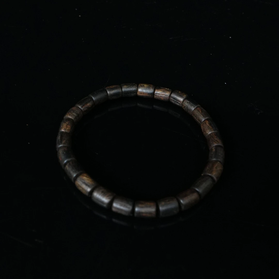 A5541 巴布亚沉香黑油沉水桶珠手串 4.79g