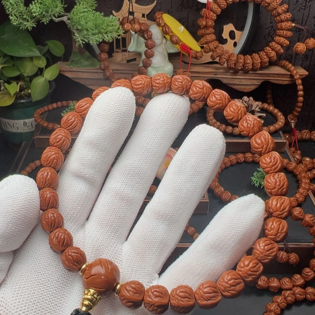 吊坠桃核克**拉1.0双脊龙手持