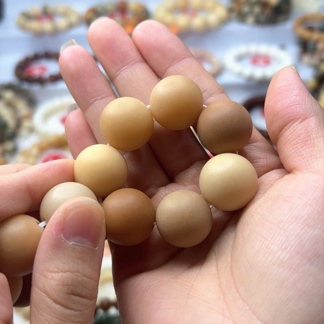 菩提根/象牙果把件安***U手捻