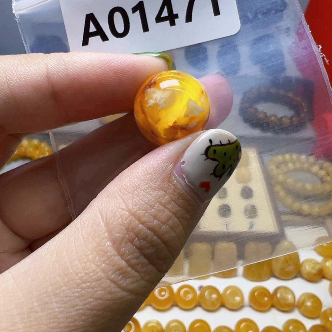 ****未镶嵌虫珀裸石1471号，15.1mm