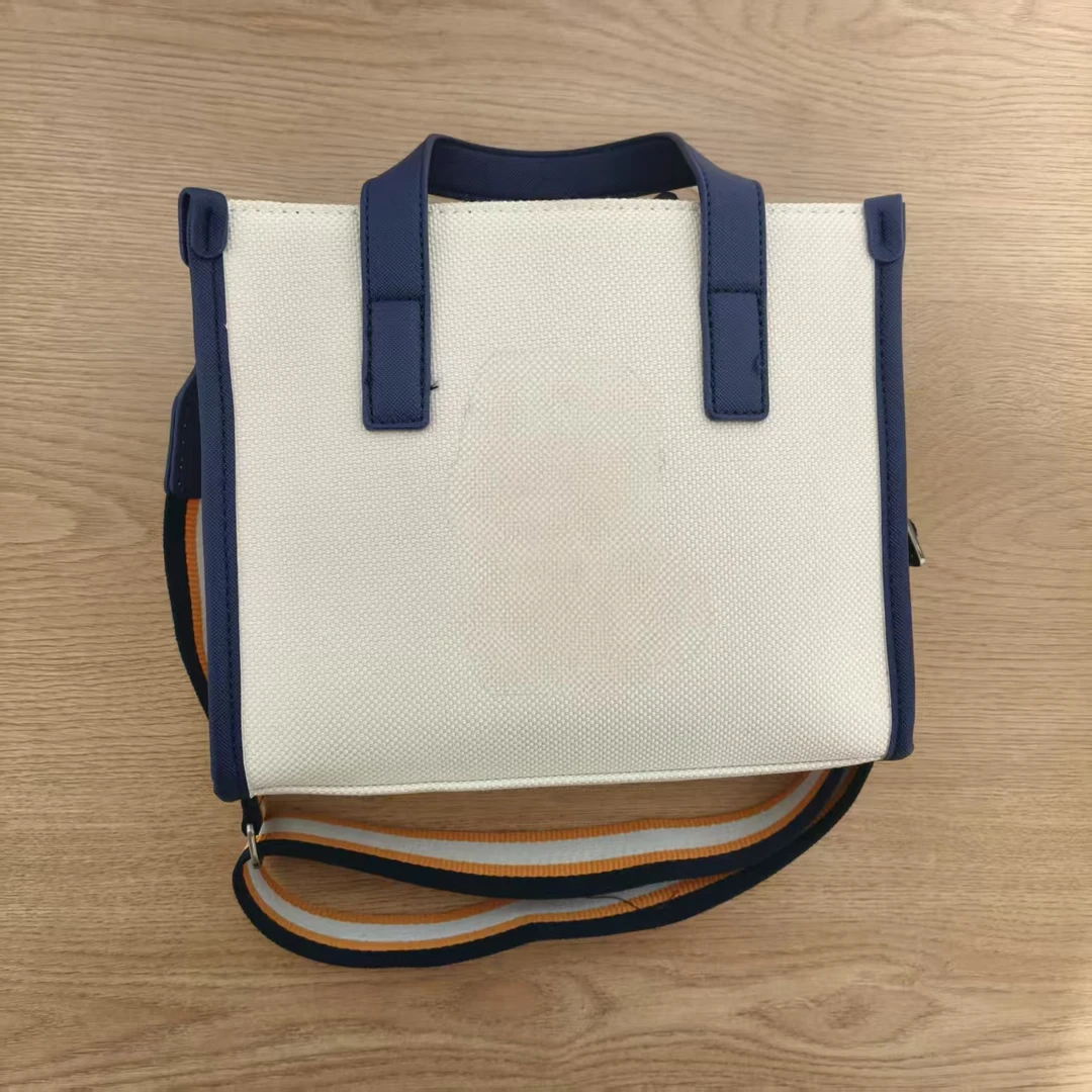 597米白色通勤手拎斜挎包