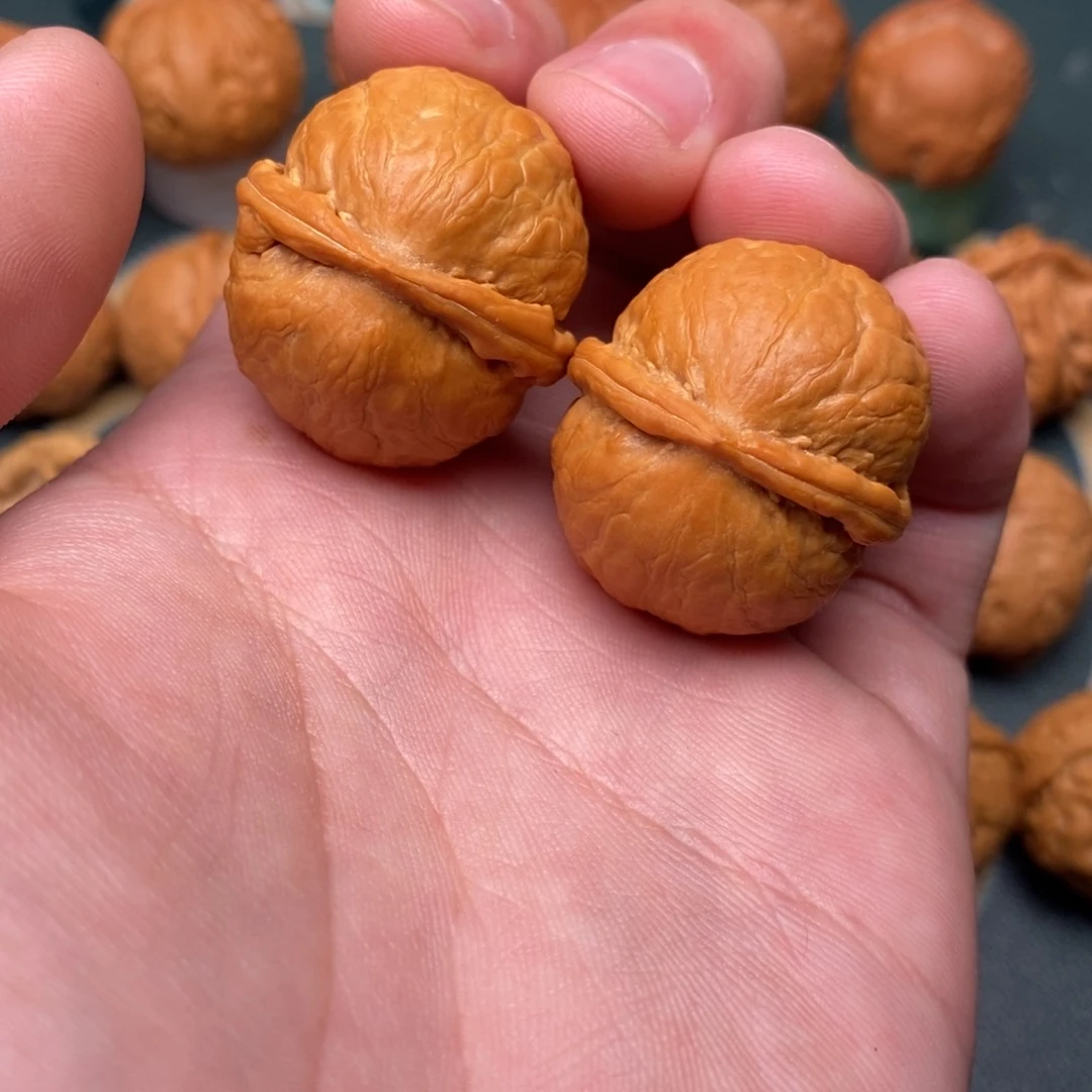 文玩核桃把件金佛